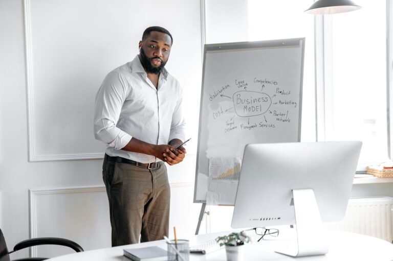 Handsome african american business coach conducts online training for colleagues or students